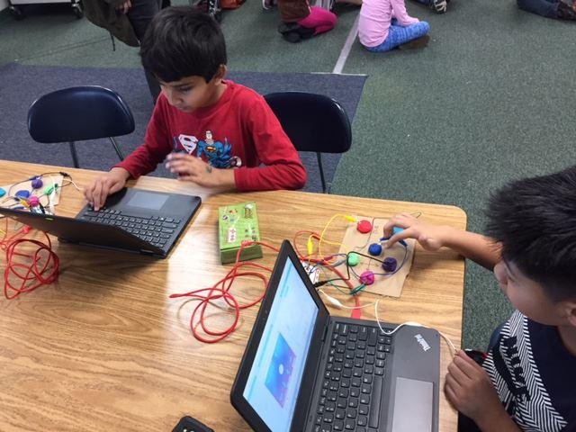 Students working with Makey Makey and Chromebooks