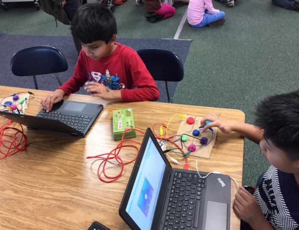 Students working with Makey Makey and Chromebooks
